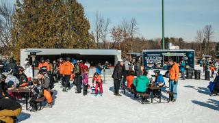 Tailgate Trailer & Traveler's Pub offer outdoor dining on snow at Granite Peak.